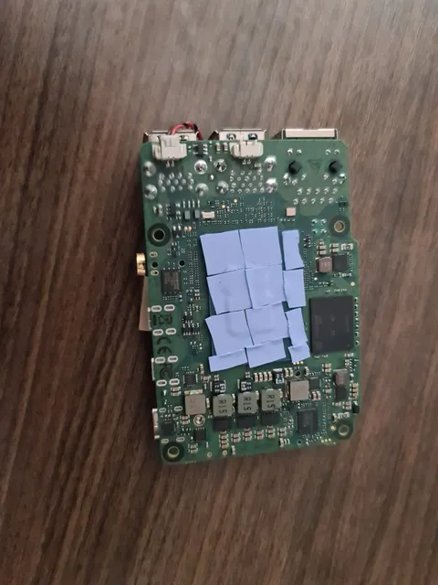 The Radxa X4 board with the thermal pads.