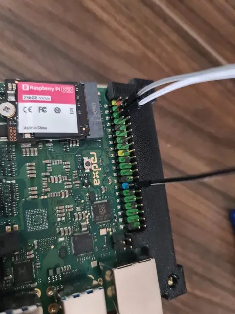 The jumper cables attached to the board.